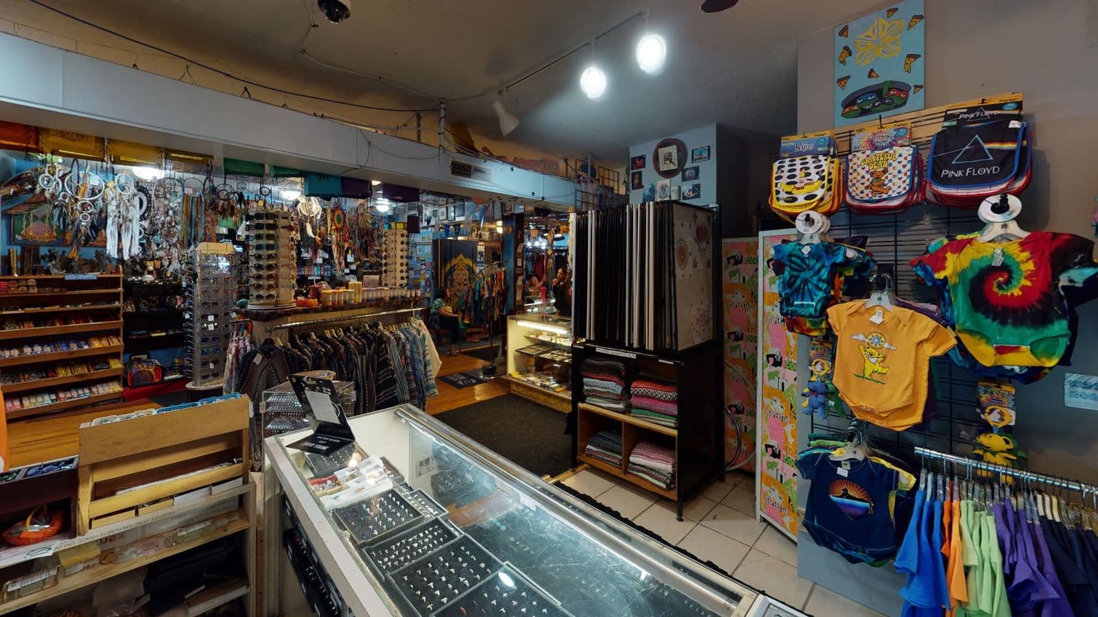 Inside Aaron's Alley, shelves of tie-dye shirts and merchandise