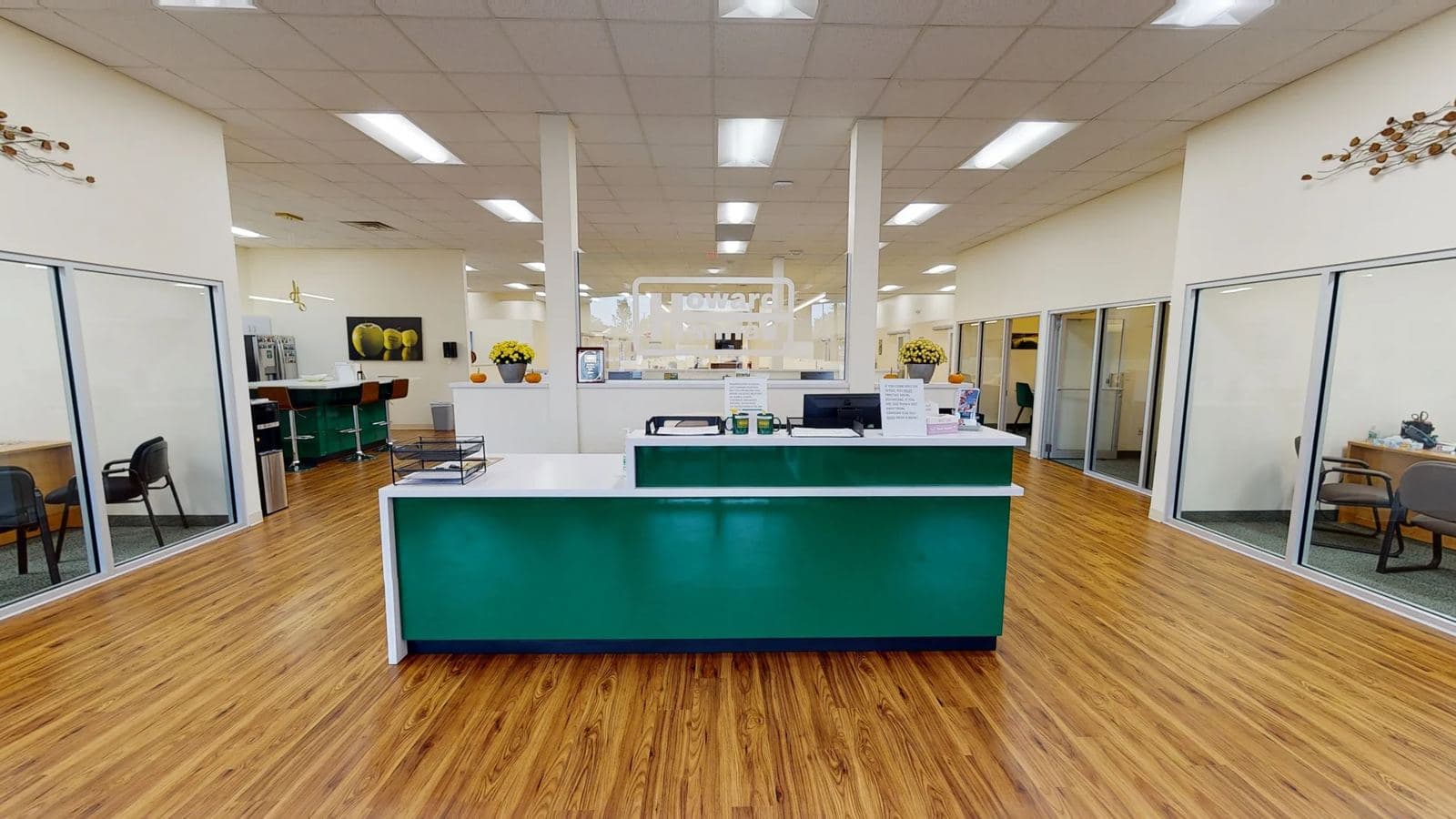 Front desk and open office at Howard Hanna in Greece, NY